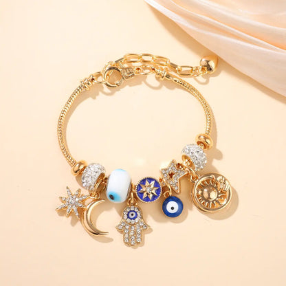 Celestial Charm Bracelet for Women | Moon, Hamsa Hand, Evil Eye & Tree of Life Charms | Gold Adjustable Chain | Fashion Jewelry Gift